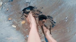 Tik Tok Topless girl walking on the public beach in wet sand