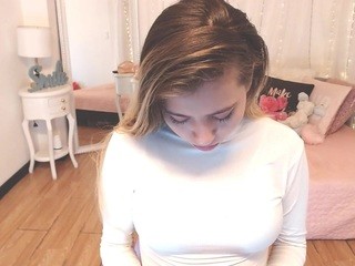 ?, ?Emily L.?? on cam for live sex chat