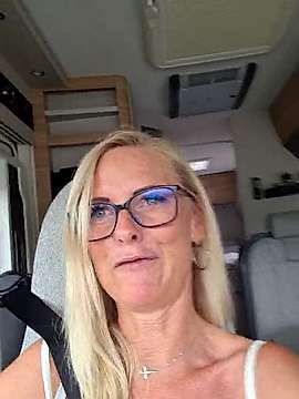 DirtyTina naked stripping on cam for live sex video chat